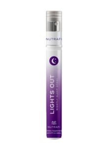 Slim, purple bottle labeled "Lights Out" with a crescent moon design, containing a nightly sleep spray by NutraFi. Silver cap. Dietary supplement.